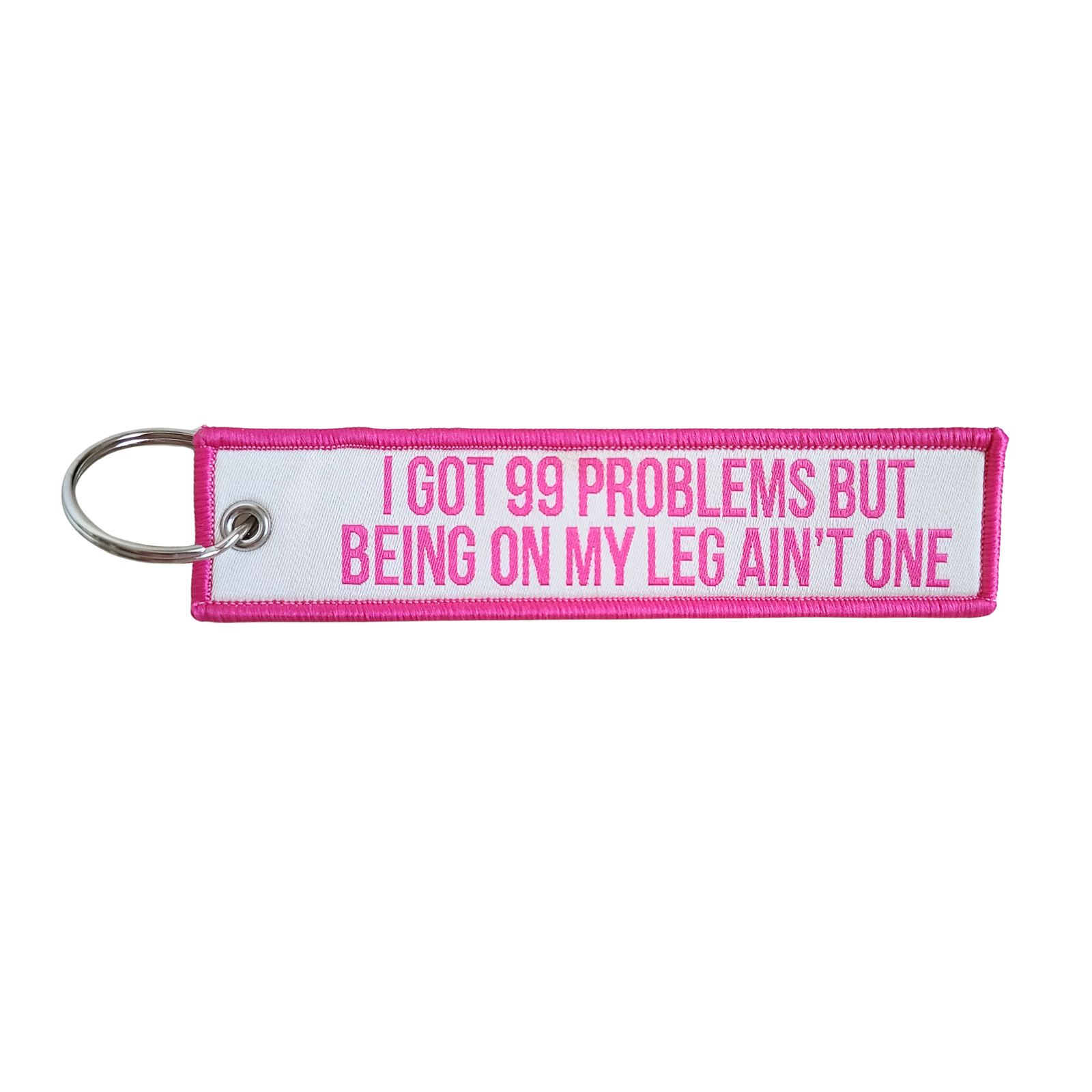 OML I got 99 problems keychain in hot pink text against a creme background