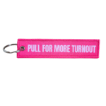 hot pink keychain that reads "Pull For More Turnout"