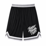 Black basketballet shorts with Ballet Trauma Club white text design on lower front leg pant.